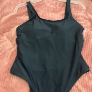 Swim suit size M black includes padding  got it from shein and never worn it